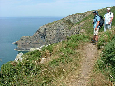 People standing on a coastline in the UK